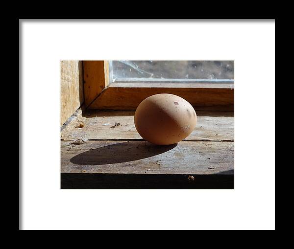 Brown Egg On Window Ledge Framed Print featuring the painting Egg on a Window Ledge by Carol Berning