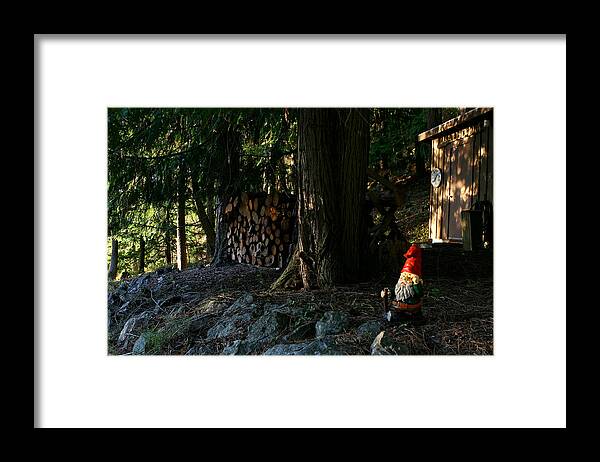 Gnome Framed Print featuring the photograph Gnome and the Woodpile by Lorraine Devon Wilke