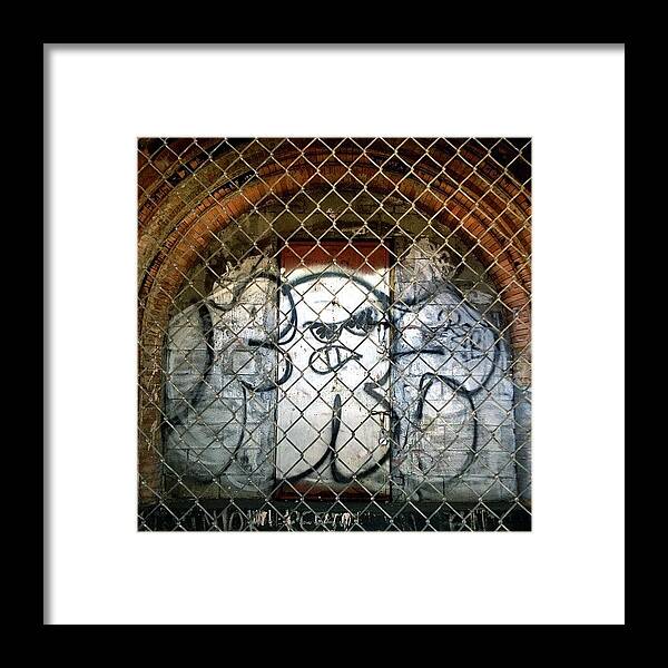 Sunsetpark Framed Print featuring the photograph Graffiti Ghost by Natasha Marco
