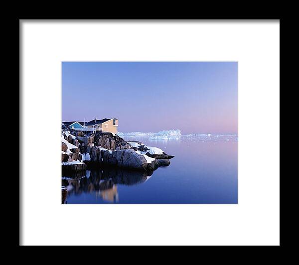 Winter Framed Print featuring the photograph Houses On The Coastline With Icebergs by Axiom Photographic