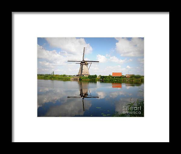 Windmill Framed Print featuring the photograph Kinderdijk Windmill by Lainie Wrightson
