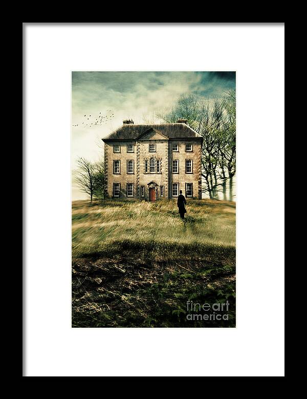 Atmospheric Framed Print featuring the photograph Man walking up path to an old country manor by Sandra Cunningham