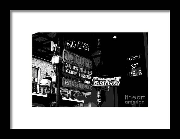 Travelpixpro New Orleans Framed Print featuring the digital art Neon Sign on Bourbon Street Corner French Quarter New Orleans Black and White Cutout Digital Art by Shawn O'Brien