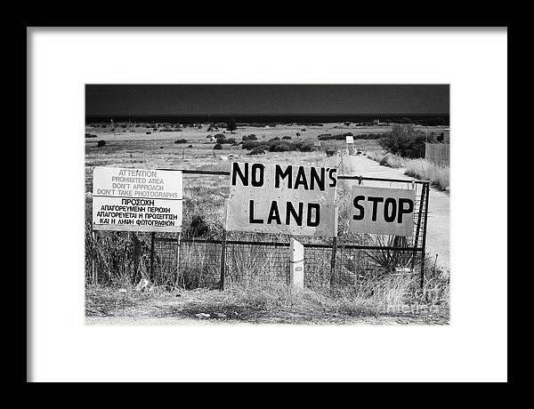 United Framed Print featuring the photograph no mans land and restricted area of the UN buffer zone in the green line dividing cyprus by Joe Fox