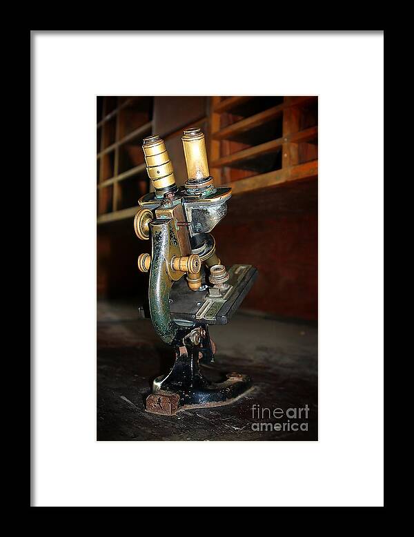 Old Framed Print featuring the photograph Old Microscope by Henrik Lehnerer