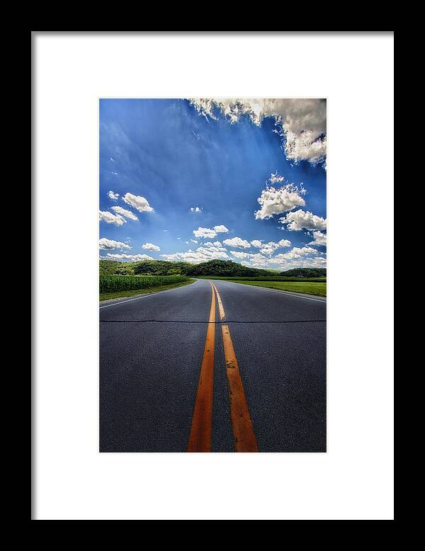 Clouds Framed Print featuring the photograph Pavement Approach by Bill and Linda Tiepelman