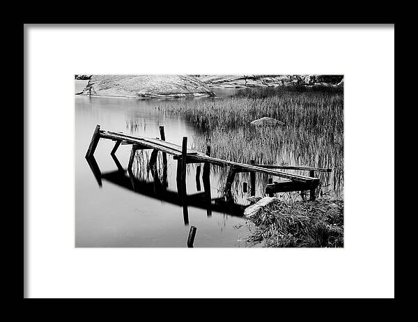 Background Framed Print featuring the photograph Pier in a bay by Matthias Siewert
