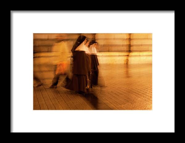 Madrid Framed Print featuring the photograph Piety In Motion by Lorraine Devon Wilke