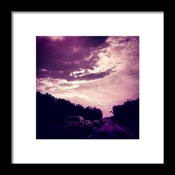 Cloudscape Framed Print featuring the photograph #purple #sky #clouds #driving by Katie Williams