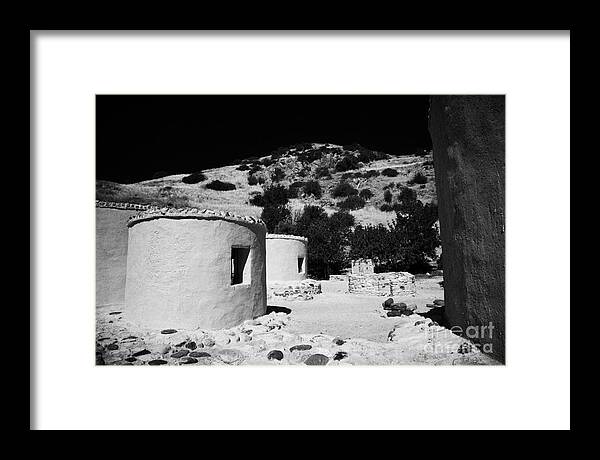 Choirokoitia Framed Print featuring the photograph reconstruction of Choirokoitia ancient neolithic village settlement republic of cyprus by Joe Fox