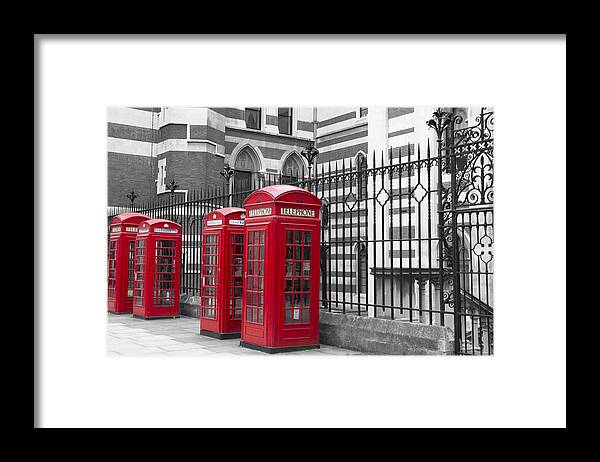 Red Telephone Boxes Outside The Law Courts In London Bw Framed Print featuring the photograph Red telephone boxes by David French
