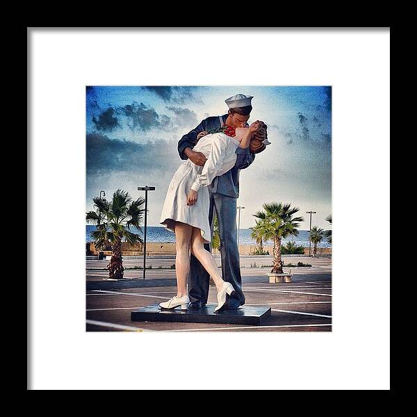 Beautiful Framed Print featuring the photograph Sailor Kissing A Nurse Statue In by Heather Meader