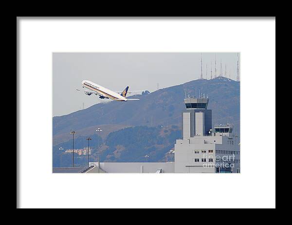Airplane Framed Print featuring the photograph Singapore Airlines Jet Airplane Over The San Francisco International Airport SFO Air Control Tower by Wingsdomain Art and Photography