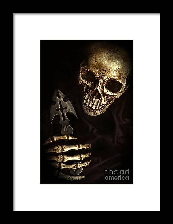 Skull Framed Print featuring the photograph Skeleton Holding Knife by HD Connelly