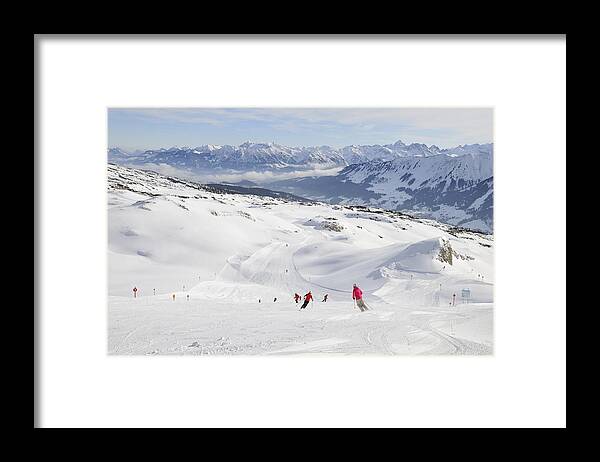 Skier Framed Print featuring the photograph Ski piste in the mountains by Matthias Hauser