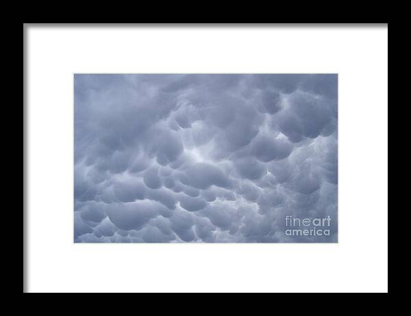 Storm Clouds Framed Print featuring the photograph Something Wicked This Way Comes by Dorrene BrownButterfield