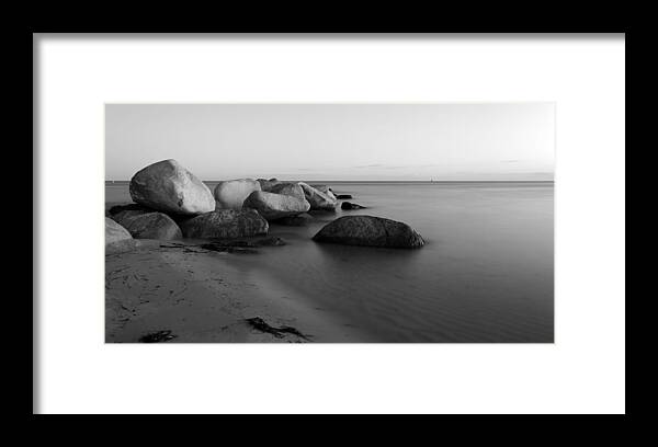 Stones In The Sea Framed Print featuring the photograph Stones in the sea 2 by Falko Follert