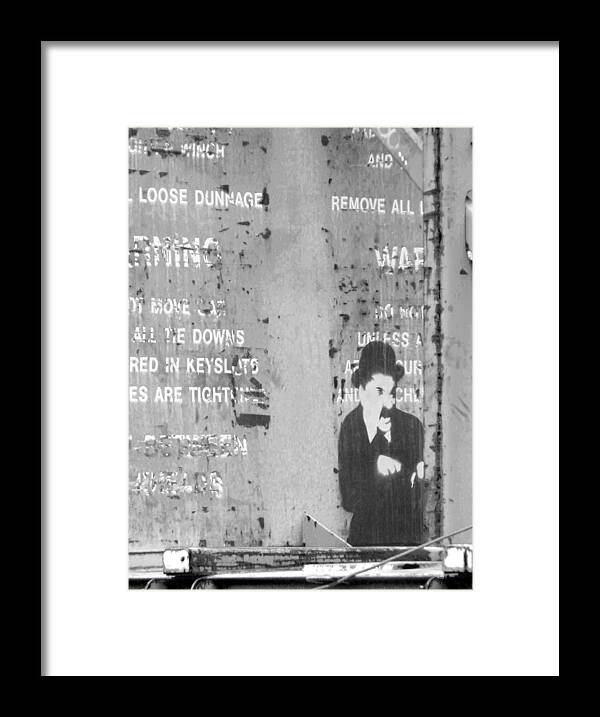 The Little Tramp Framed Print featuring the photograph Street Graffiti Art - the little Tramp bw by Kathleen Grace