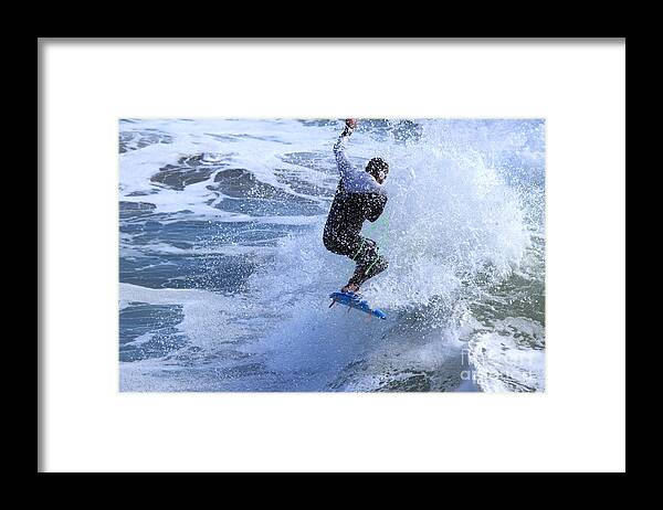 Surfing Framed Print featuring the photograph Surfer by Henrik Lehnerer