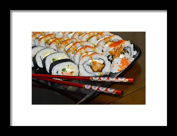 Chop Sticks Framed Print featuring the photograph Sushi and Chopsticks by Carolyn Marshall