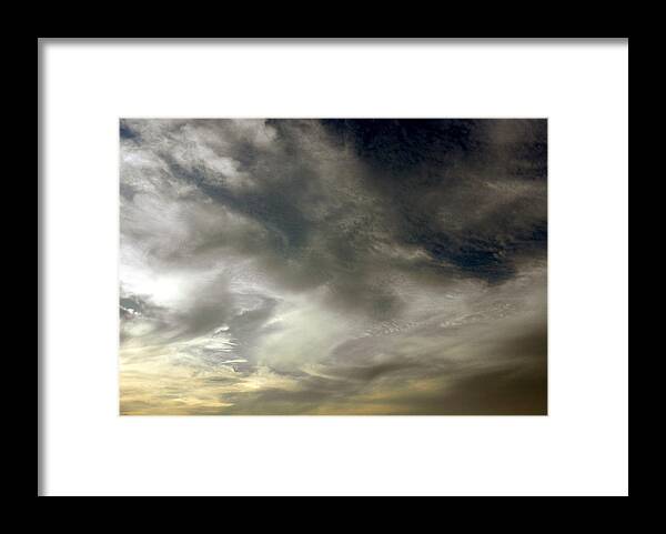 Clouds Framed Print featuring the photograph Swirls At Sundown by Kim Galluzzo