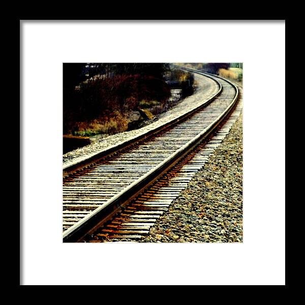 Railroad Tracks Framed Print featuring the photograph The Long Way Home by Karen Wiles