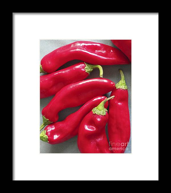 Chili Pepper Framed Print featuring the photograph The Red P's by Steve Outram