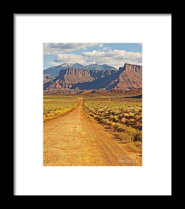 Photograph Framed Print featuring the photograph The Road Beckons by Bob and Nancy Kendrick