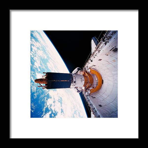 Square Framed Print featuring the photograph The Space Shuttle In Orbit With Its Cargo Bay Open by Stockbyte