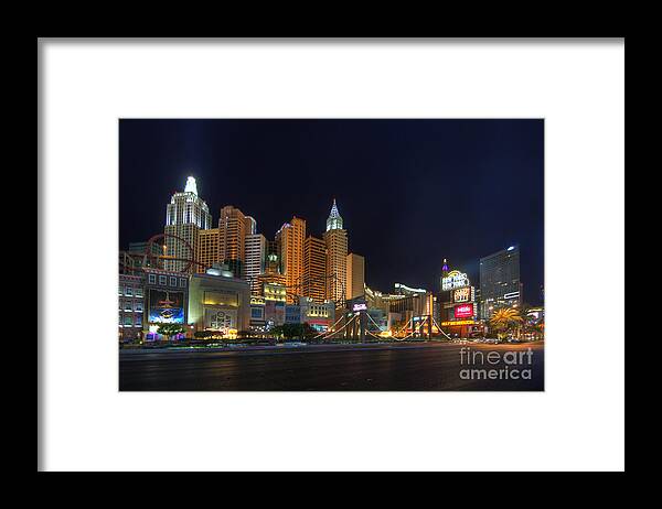 Art Framed Print featuring the photograph The Strip by Yhun Suarez