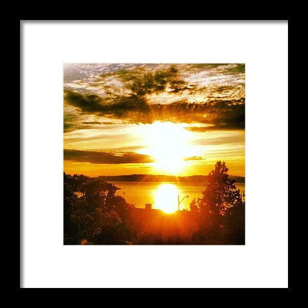 Solnedgang Framed Print featuring the photograph The sunny sunset by Kim Nyheim