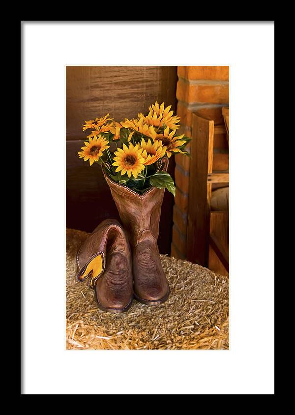 Flowers Framed Print featuring the photograph These Boots Were Made For by Gordon Engebretson