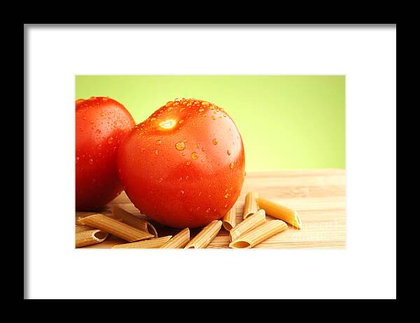 Tomato Framed Print featuring the photograph Tomatoes and pasta by Blink Images