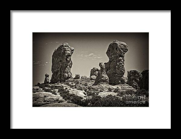 Arches National Park Moab Framed Print featuring the photograph Twin Lions by Linda Constant