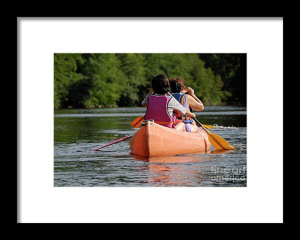 40-44 Years Framed Print featuring the photograph Two women rowing on a canoe by Sami Sarkis