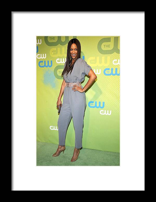 Tyra Banks Framed Print featuring the photograph Tyra Banks Wearing A Marley Jumpsuit by Everett