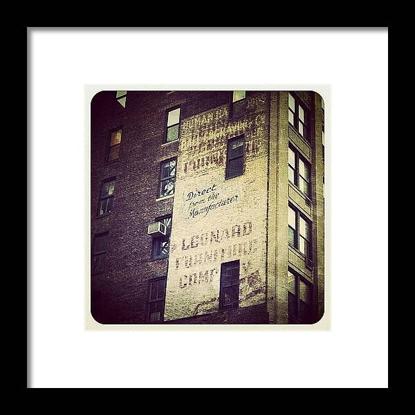 Building Framed Print featuring the photograph Vintage Advertising by Natasha Marco