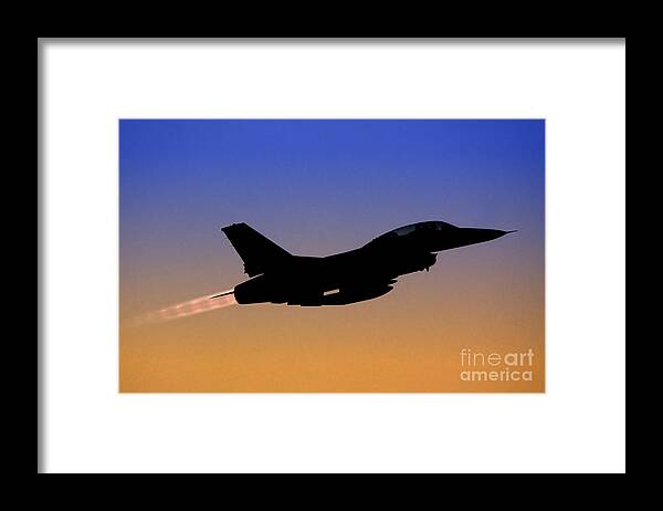 Aircraft Framed Print featuring the photograph IAF F-16B Fighter jet at sunset by Nir Ben-Yosef