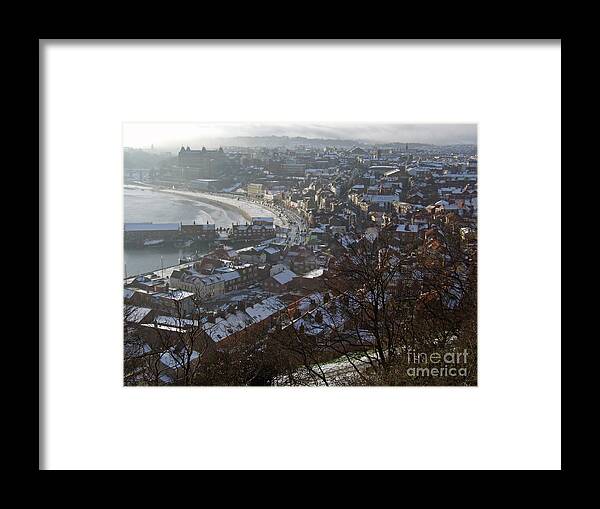 Snow Showers Framed Print featuring the photograph A Winter's Day at Scarborough by Phil Banks