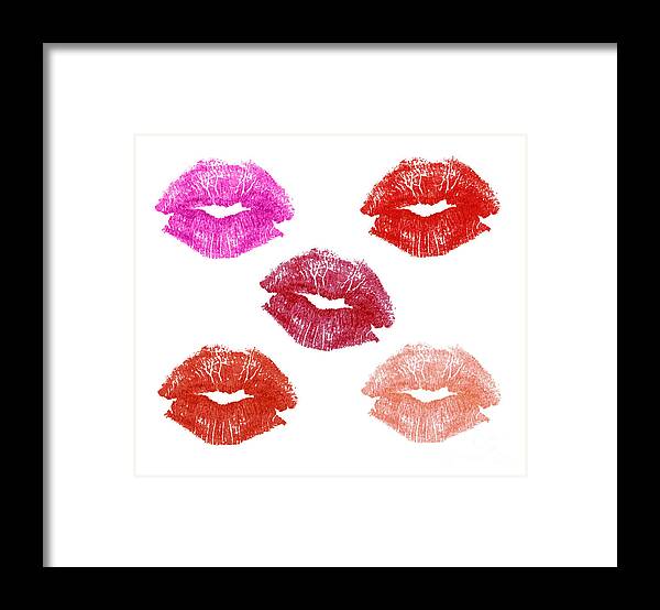 Lips Framed Print featuring the photograph Graphic lipstick kisses #1 by Blink Images