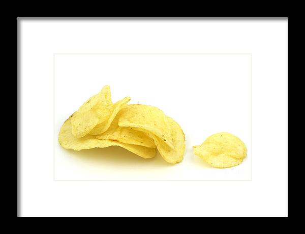 Potato Framed Print featuring the photograph Potato chips #1 by Blink Images