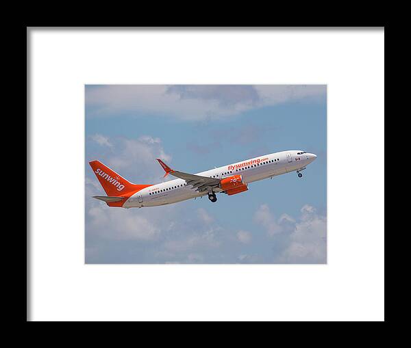 Sunwing Framed Print featuring the photograph Sunwing Airlines #1 by Dart Humeston
