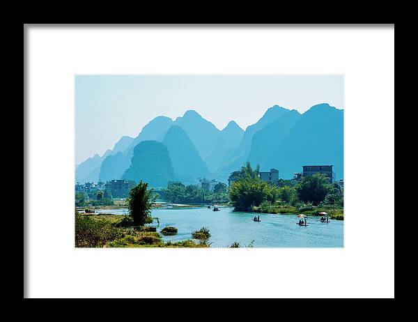 Nature Framed Print featuring the photograph The karst mountains and river scenery #1 by Carl Ning
