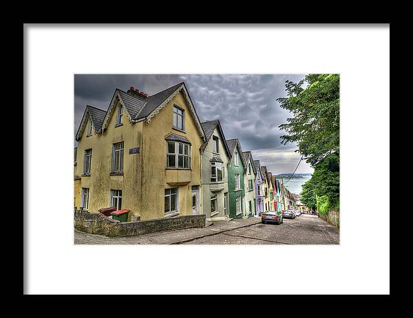 Cobh Munster Province Republic Of Ireland ‘deck Of Cards’ (23 Houses) Framed Print featuring the photograph Cobh Munster Province Republic of Ireland by Paul James Bannerman