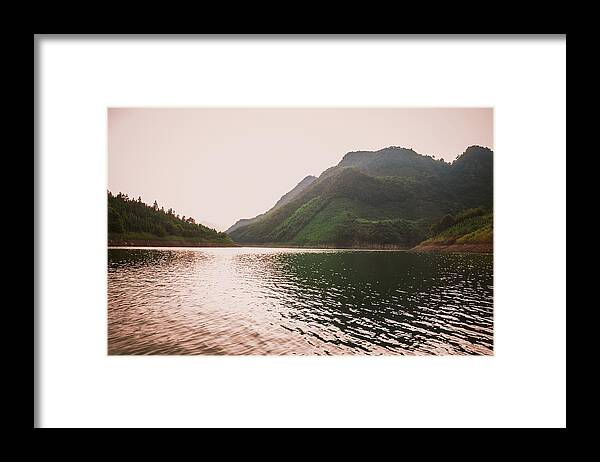 Red Framed Print featuring the photograph The mountains and lake scenery in sunset #18 by Carl Ning