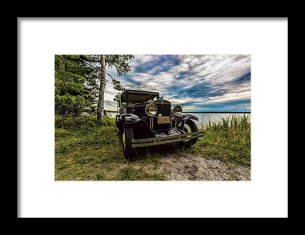 Higgins Lake Framed Print featuring the photograph 1930 Chevy on the shore of Higgins Lake by Joe Holley