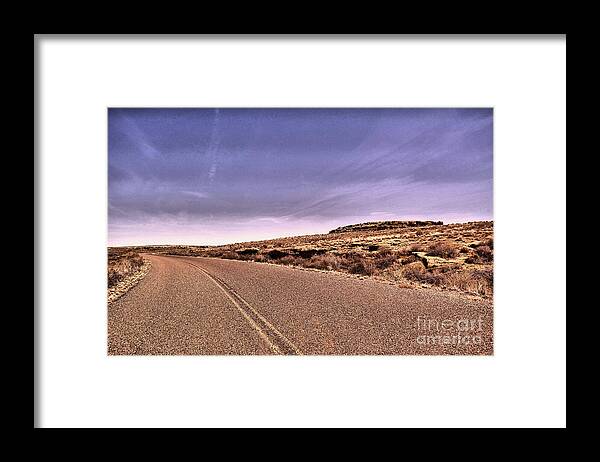 Road Framed Print featuring the photograph That long long road #2 by Jeff Swan