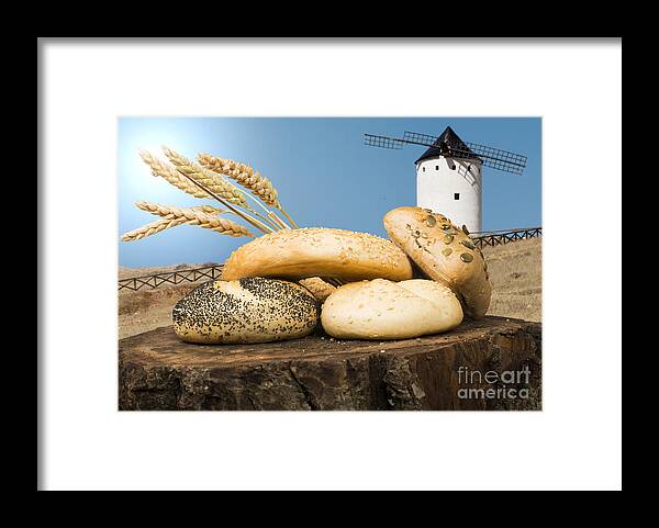 Agriculture Framed Print featuring the photograph Different breads and windmill in the background #3 by Deyan Georgiev