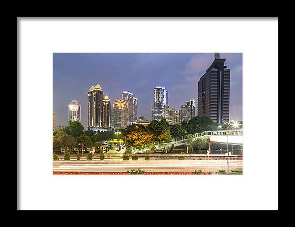 Indonesia Framed Print featuring the photograph Jakarta twilight #3 by Didier Marti