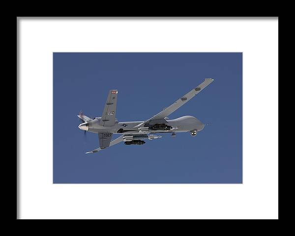 Agm-114 Hellfire Framed Print featuring the photograph An Mq-9 Reaper Flies A Training Mission #4 by HIGH-G Productions